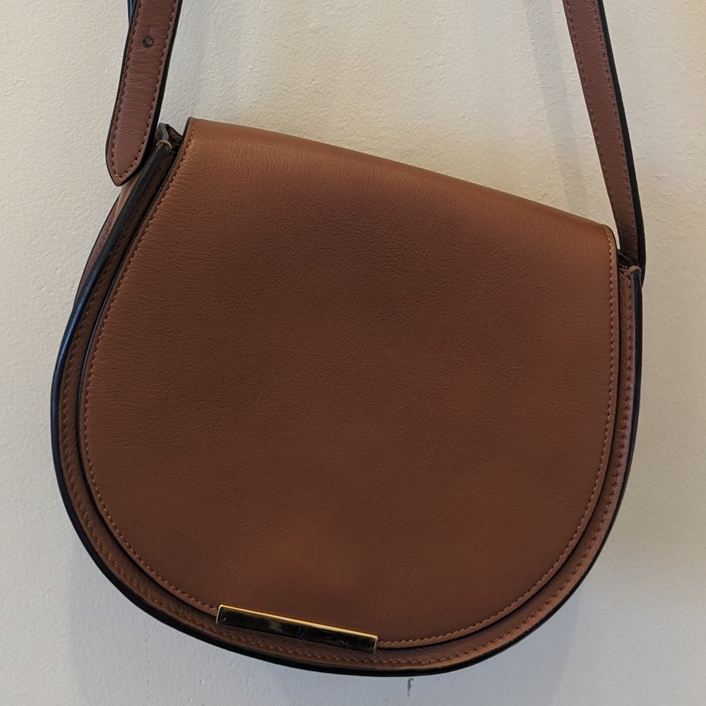 Cuyana mini saddle bag in caramel